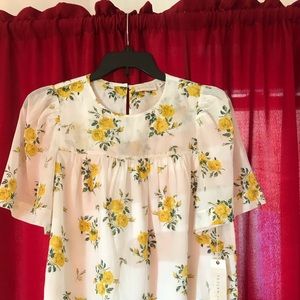 Kate Hudson’s Happy by Nature medium flower top.